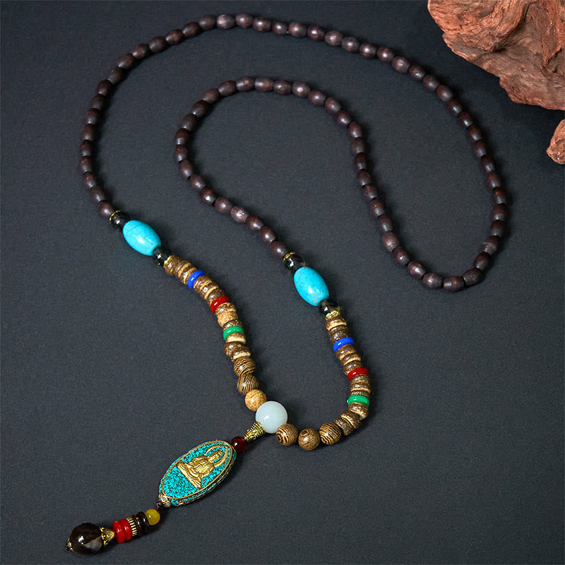 Braune Perlenkette mit Türkis-Anhänger Avalokitesvara vintage Harmonie Meditation