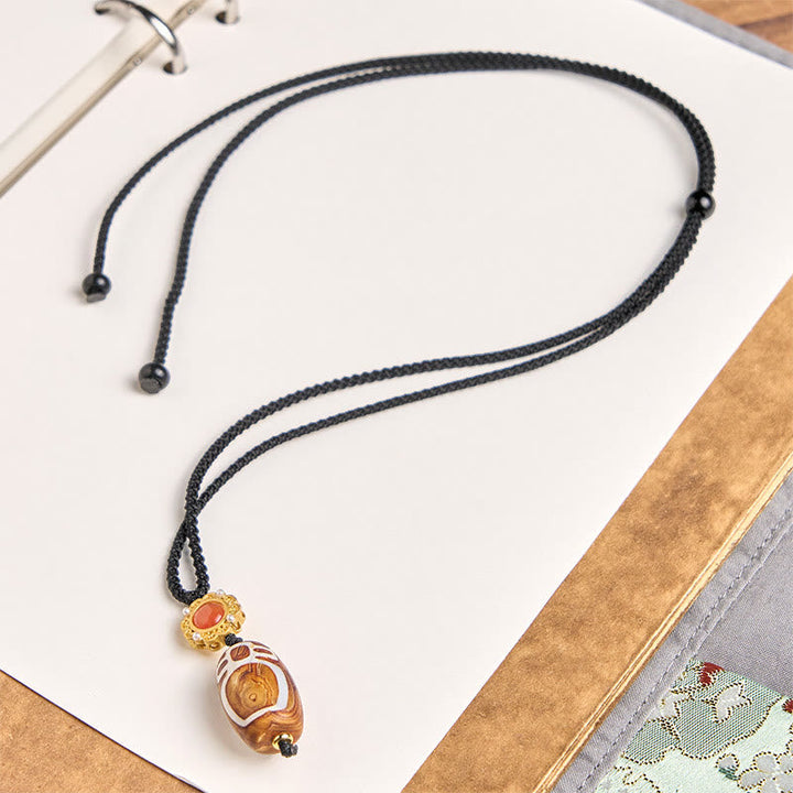 Schwarze Tibetische Kette Dzi Anhänger orange Naturstein Segen