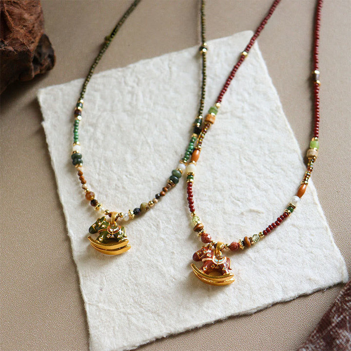 Kette Granat Jade Pferd – Glück