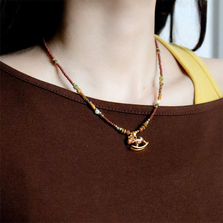 Kette Granat Kupfer Pferd – Schutz
