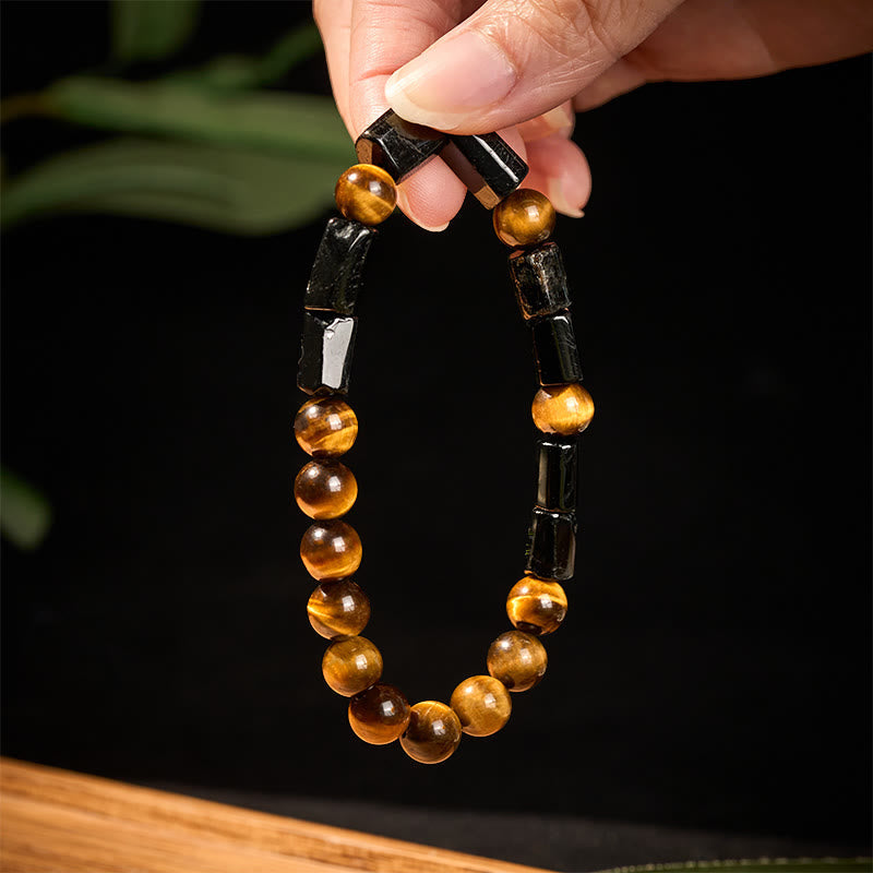 Armband Tigerauge – Energie mit schwarzem Holz elegant getragen