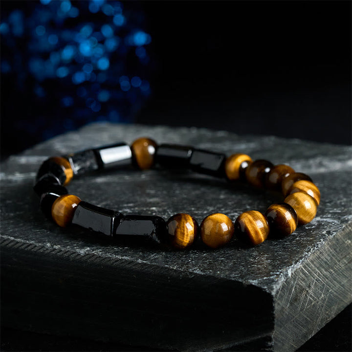 Armband Tigerauge – Energie mit schwarzen Hämatit Perlen elegant.