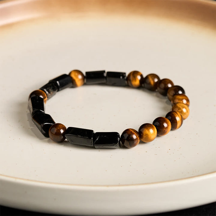 Armband Tigerauge – Energie mit schwarzen Hämatit Perlen elegant.