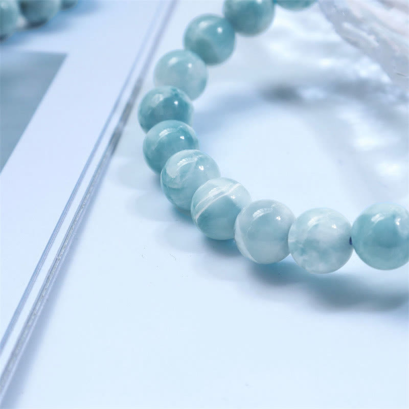Larimar Armband mit hellblauen polierten Naturstein Perlen elastisch