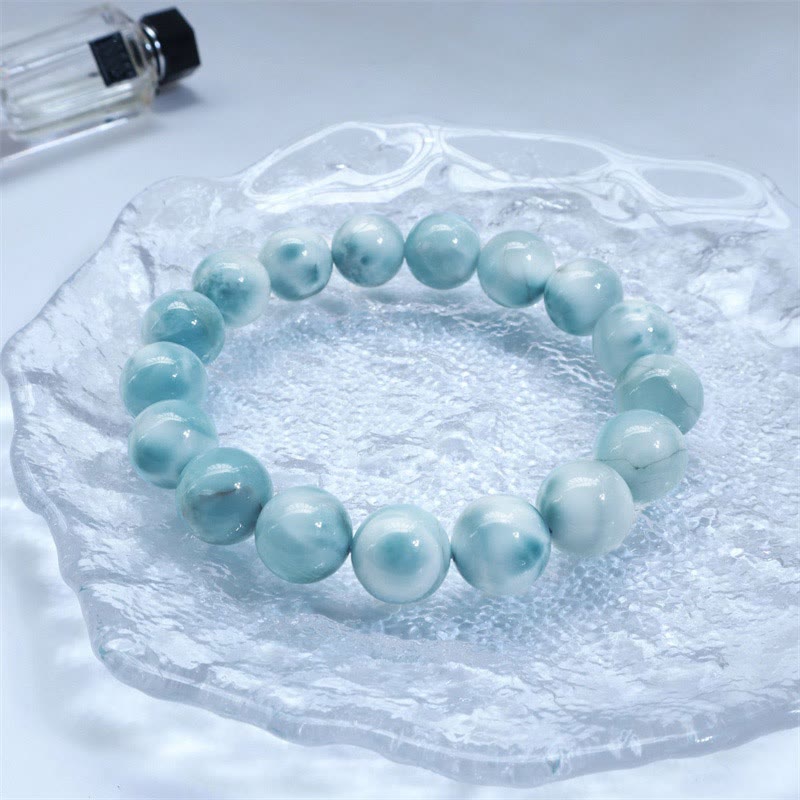 Armband Larimar Weisheit Selbstvertrauen hellblau Perlen elastisch Naturstein