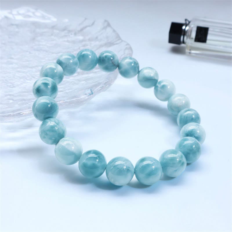 Larimar Armband Weisheit Selbstvertrauen hellblau Naturstein elastisch getragen