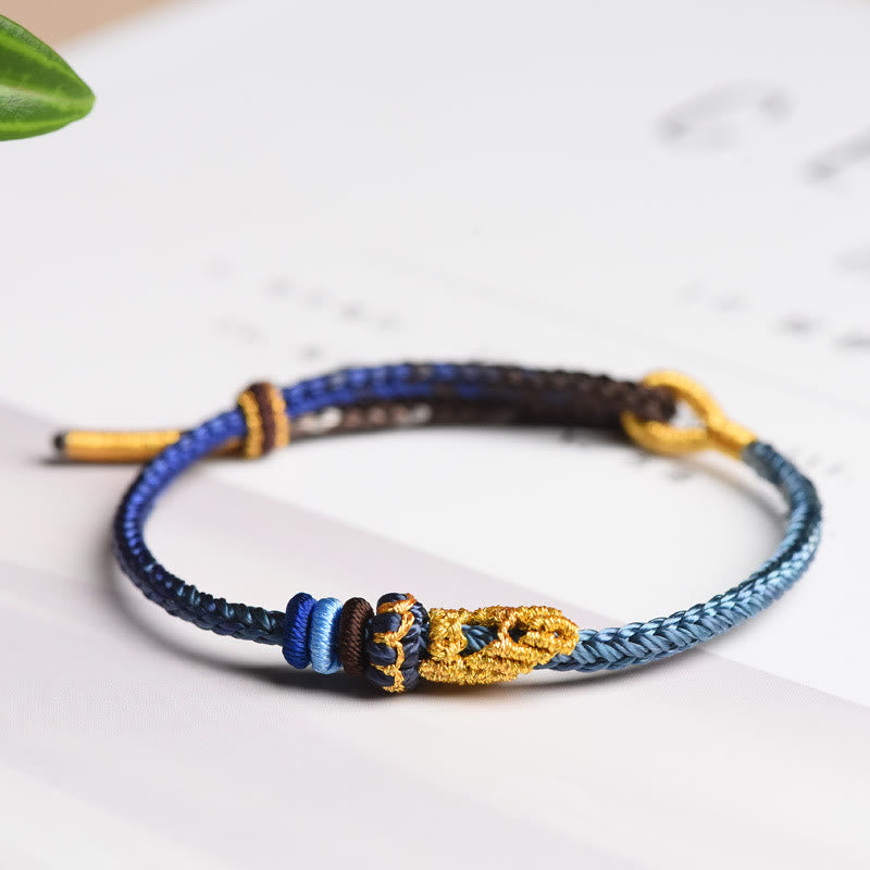 Armband Geflochten Friedensknoten – Schutz & Glück blau gold Flachware.