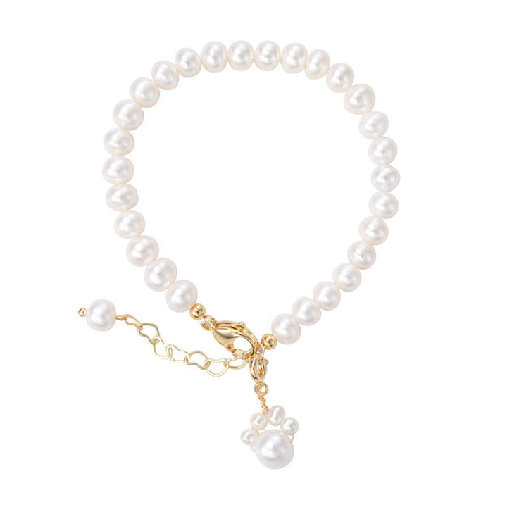 Armband Perle Katze – Heilung elegantes Perlenarmband mit goldener Schließe