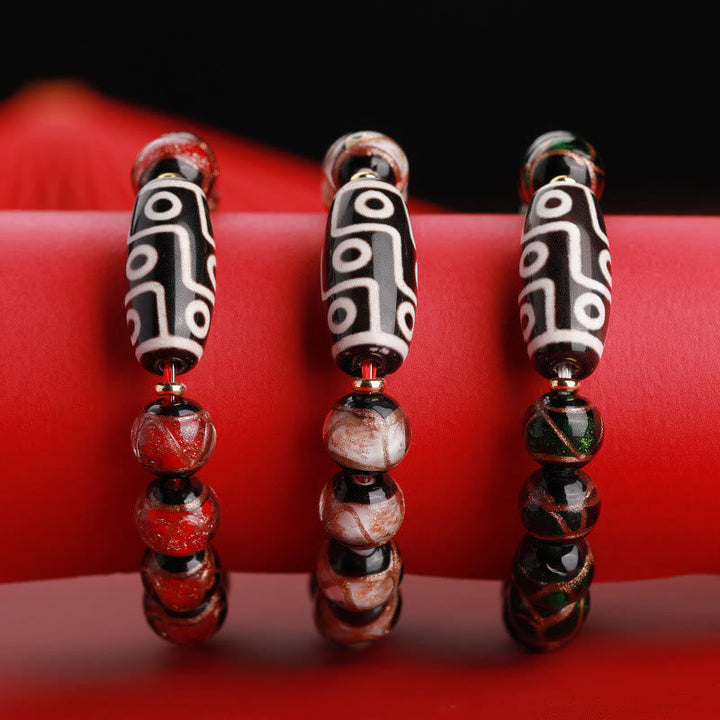 Armband – Wohlstand Balance mit Achat Perlen und silbernen Tibetan Beads.