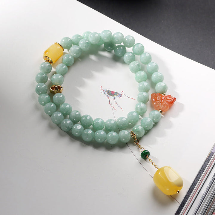 Jade Armband mit grünen Perlen, gelbem Anhänger und Schmetterling-Accessoires