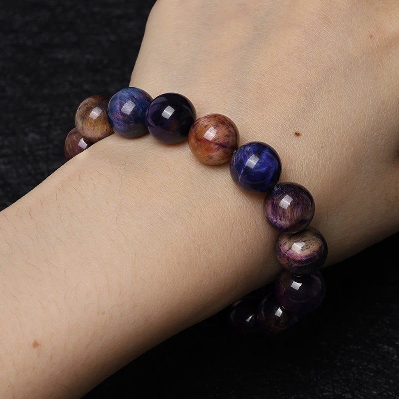 Armband Tigerauge Lapis Lazuli Naturstein Perlen elastisch Handgelenk getragen