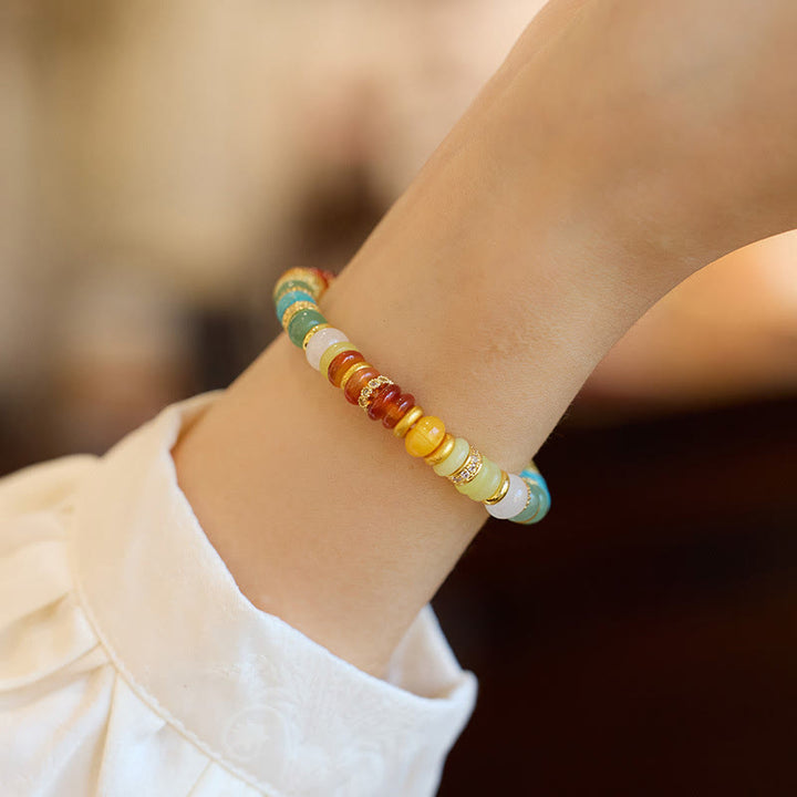 Armband Roter Achat Jade bunte Perlen Naturstein elastisch Handgelenk getragen