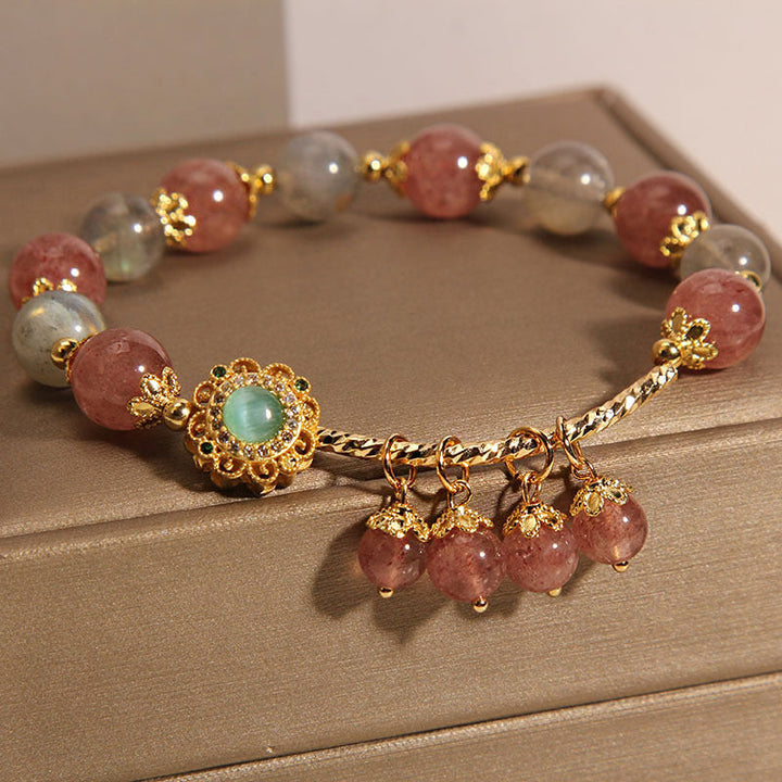 Armband Erdbeerquarz Mondstein gold Perlen elegant Heilstein Schmuck