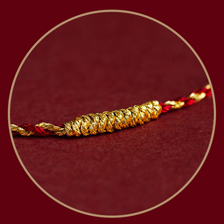 Rotes und goldenes geflochtenes Armband 14K Gold Knoten Glück elegant.
