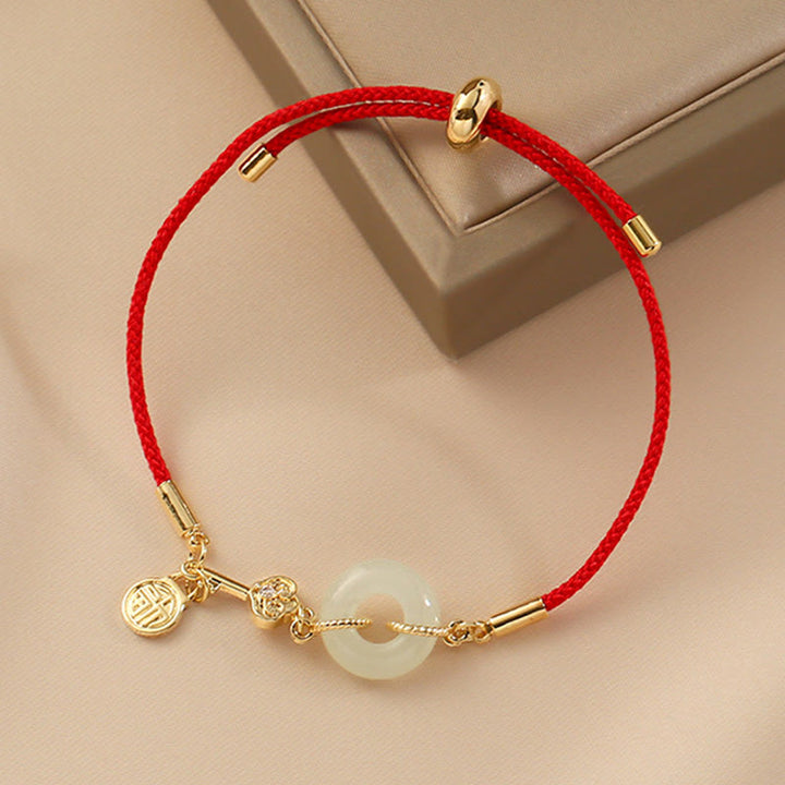 Armband Jade Friedensring Rot Fu Symbol Wohlstand