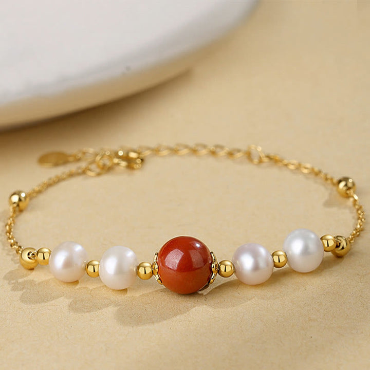 Armband mit Perlen und rotem Zinnober Stein Gold Kette elegant