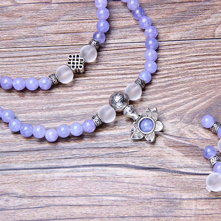 Mala Jaspis – Stärke Armband mit lavendelfarbenem Stein und Blütenanhänger