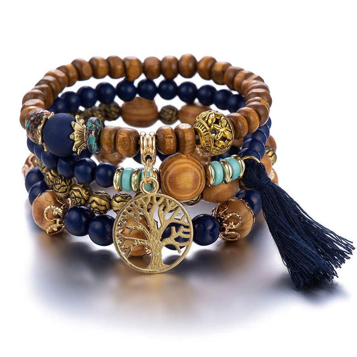 Armband – Heilung mit Holzperlen, Lapislazuli und Baum-Anhänger elegant.