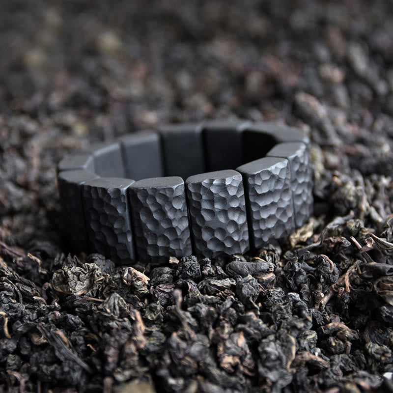 Armband Ebenholz Paar Frieden schwarzer Stein Textur Natur