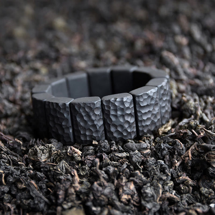 Armband Ebenholz Paar Frieden schwarzer Stein Textur Natur