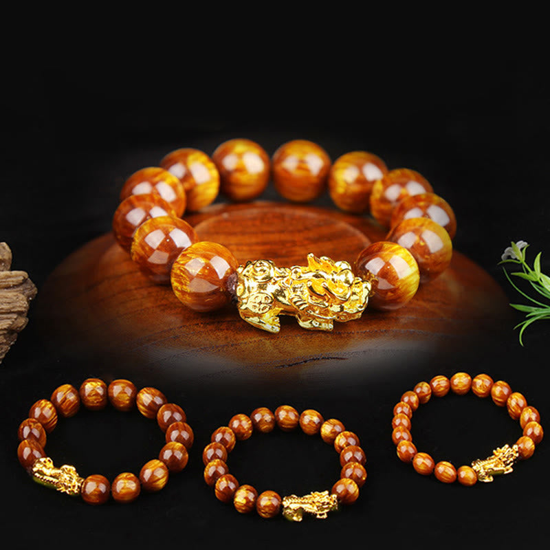 Armband Tigerauge Pixiu Glück goldene Perlen Naturstein Schmuck Display