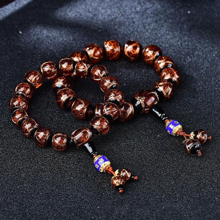 Armband Achat Drachen – Heilung mit braunen Perlen blauem Achat