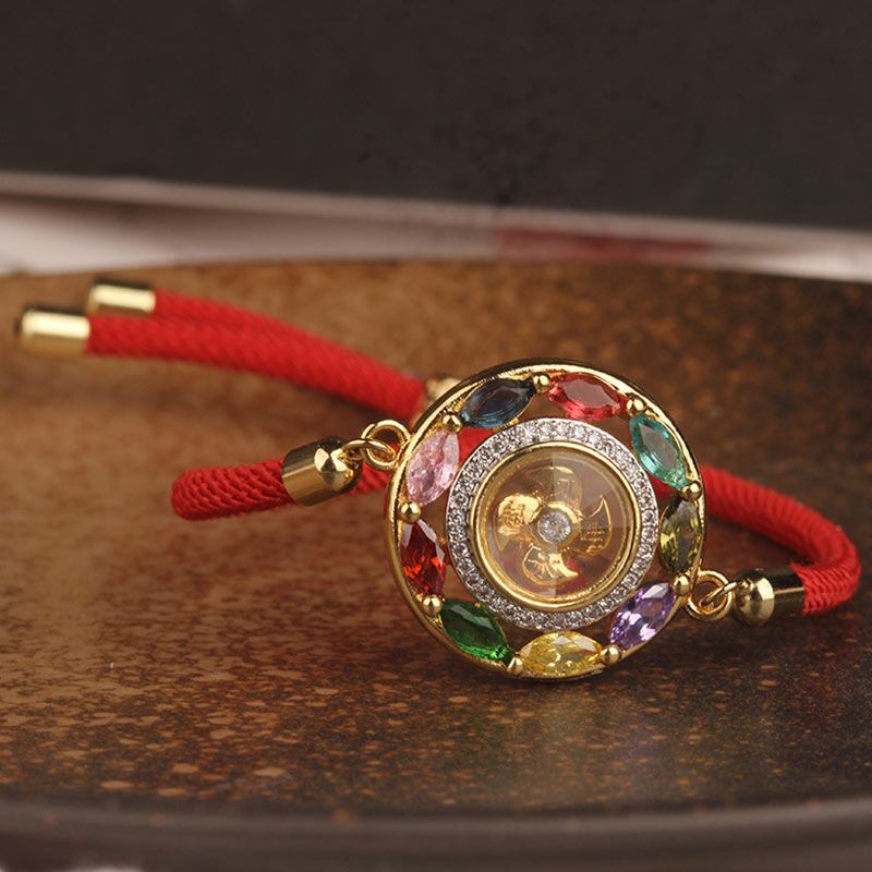 Armband Kupfer mit Glück & Wohlstand Motiv, farbige Steine, rotes Textilband.