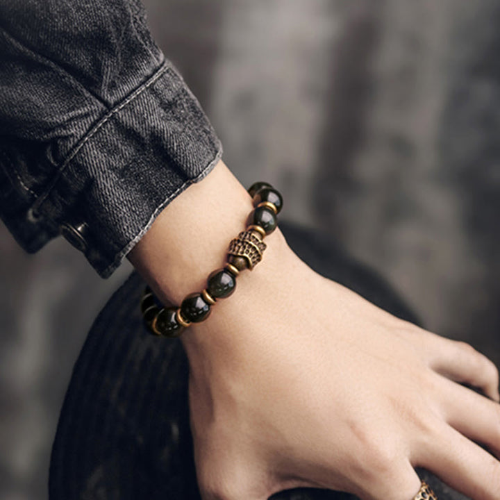 Armband Obsidian Kupfer mit Perlen am Handgelenk getragen elegant