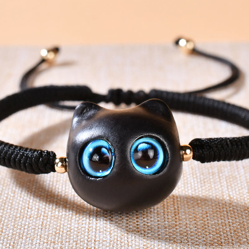 Armband Ebenholz Katze mit blauen Augen schwarzes elastisches Textilband
