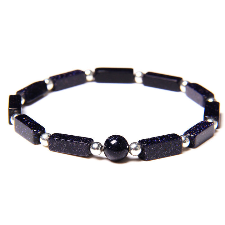 Schwarzes Glitzer Armband mit silbernen Perlen flach gelegt Nahaufnahme