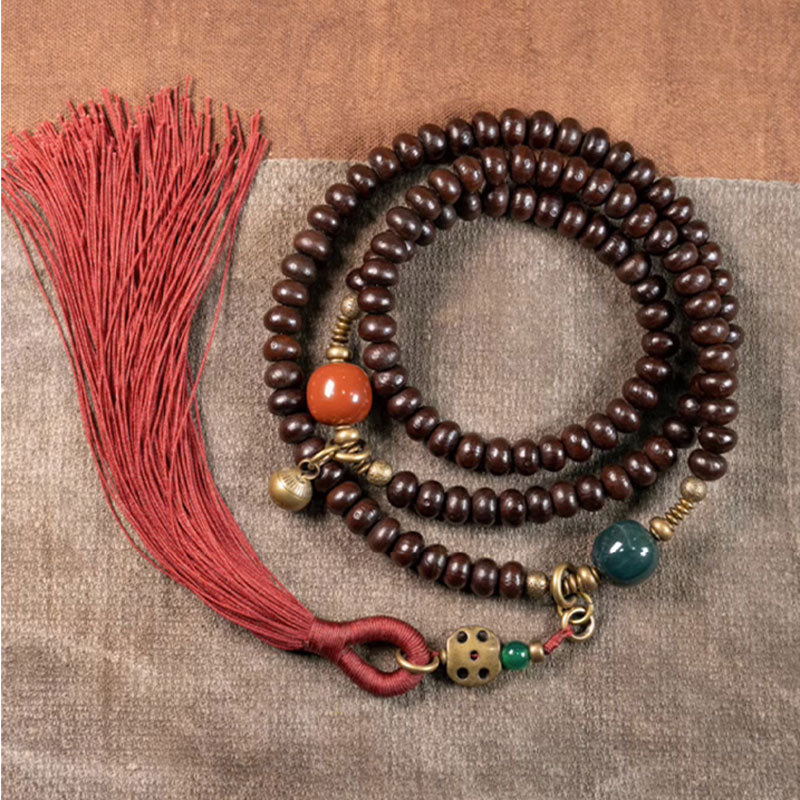 Mala 108 Perlen Bodhi – Stärke Holzperlen Armband mit roter Quaste Anhänger