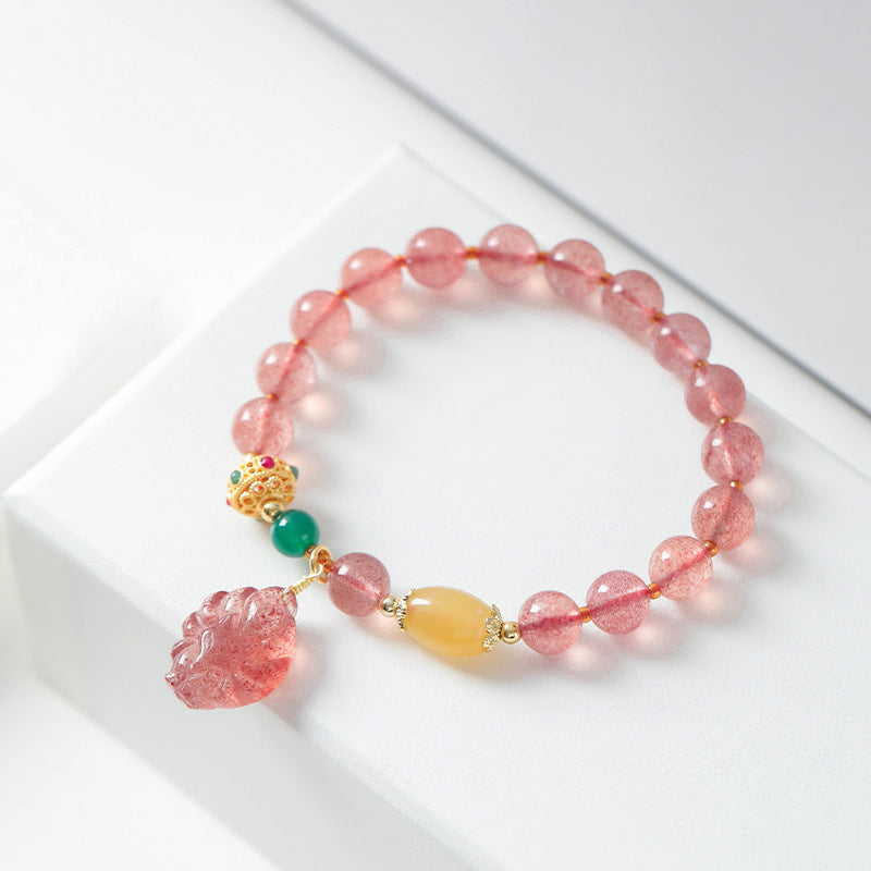 Armband Erdbeerquarz Fuchs – Heilung rosa Perlen goldene Verschlüsse elegant.