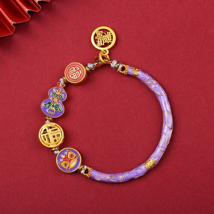Armband – Glück & Wohlstand Energie lila Jade goldene Perlen Glückssymbole