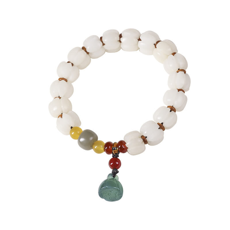 Armband Roter Achat Bodhi Lotus mit grünem Anhänger elastisch