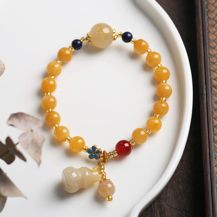 Jade Armband Gold mit gelben Steinen und Anhänger Glück Wohlstand