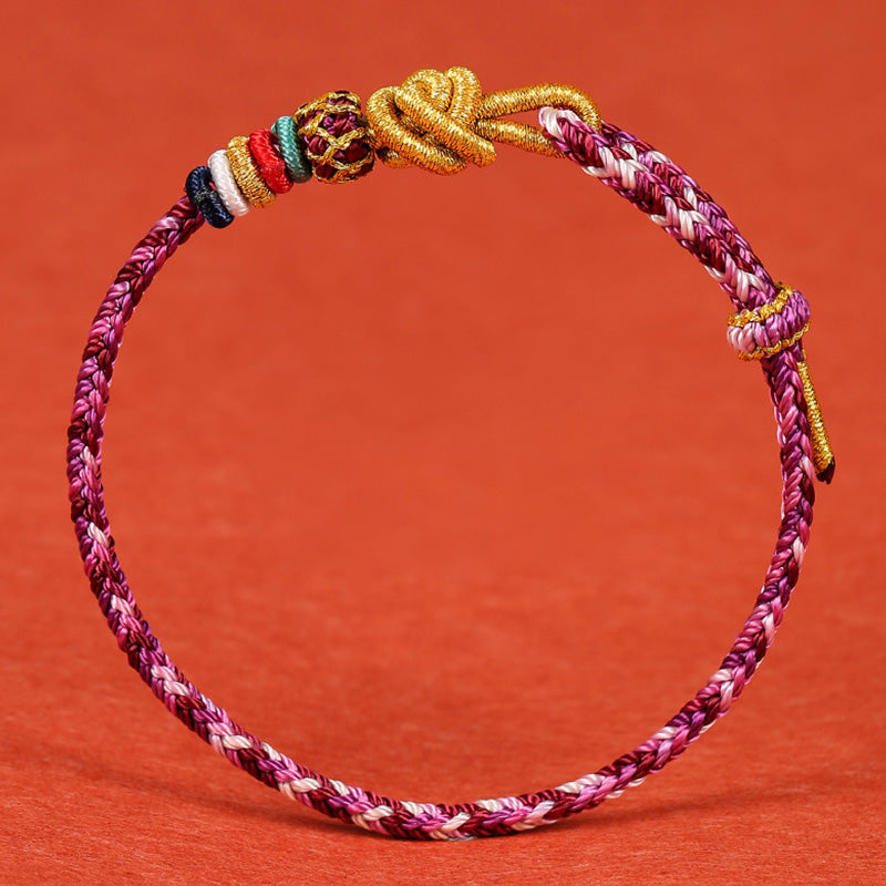Buntes geflochtenes Armband Dunhuang mit goldenen Knoten Schutz