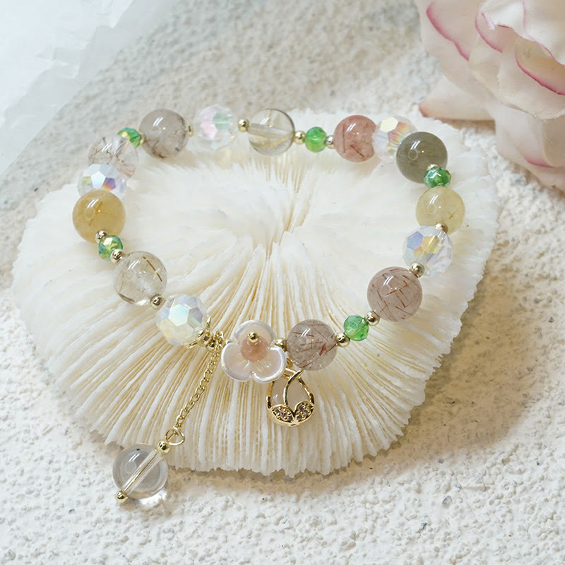 Armband Erdbeerquarz Fluorit Heilung Naturstein Perlen elegant.