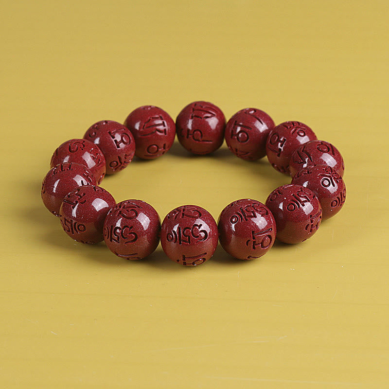 Zinnober Armband mit Om Mani Padme Hum Gravur, rote Perlen Glück Wohlstand