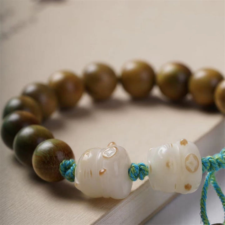 Armband Sandelholz Bodhi Katze Glück Energie Naturstein elastisch Schnur