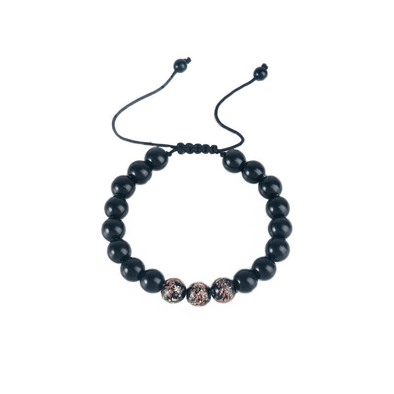 Armband Schwarzer Obsidian mit rosegoldfarbenen Akzentperlen elastisch