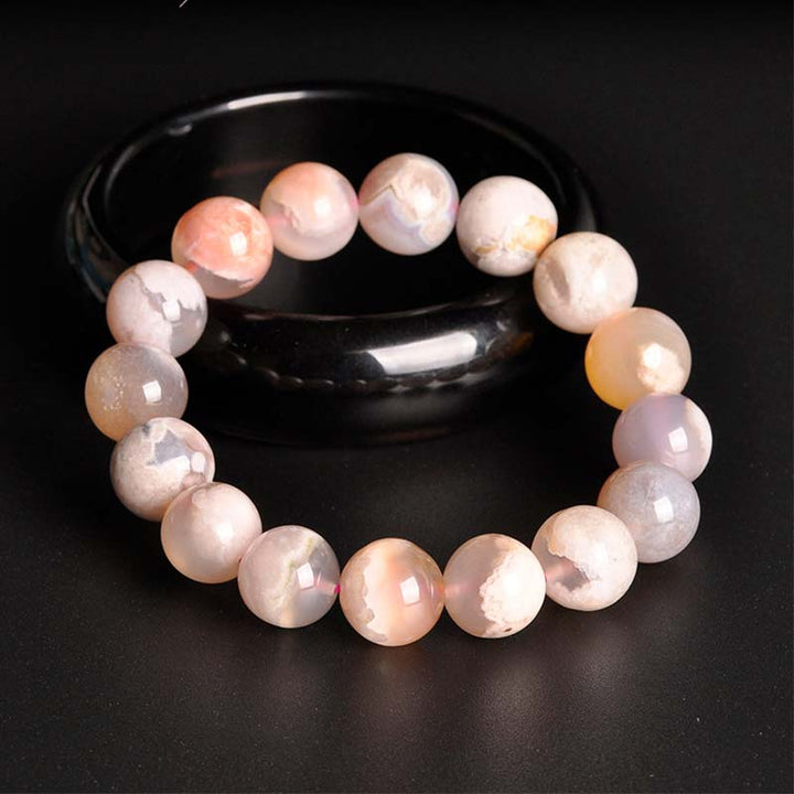 Armband Achat – Frieden & Segen, rosa Perlen, Naturstein, elastisch getragen