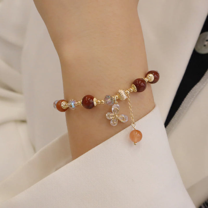 Armband Kristall Schmetterling – Wohlstand mit Roter Jade Perlen elegant.