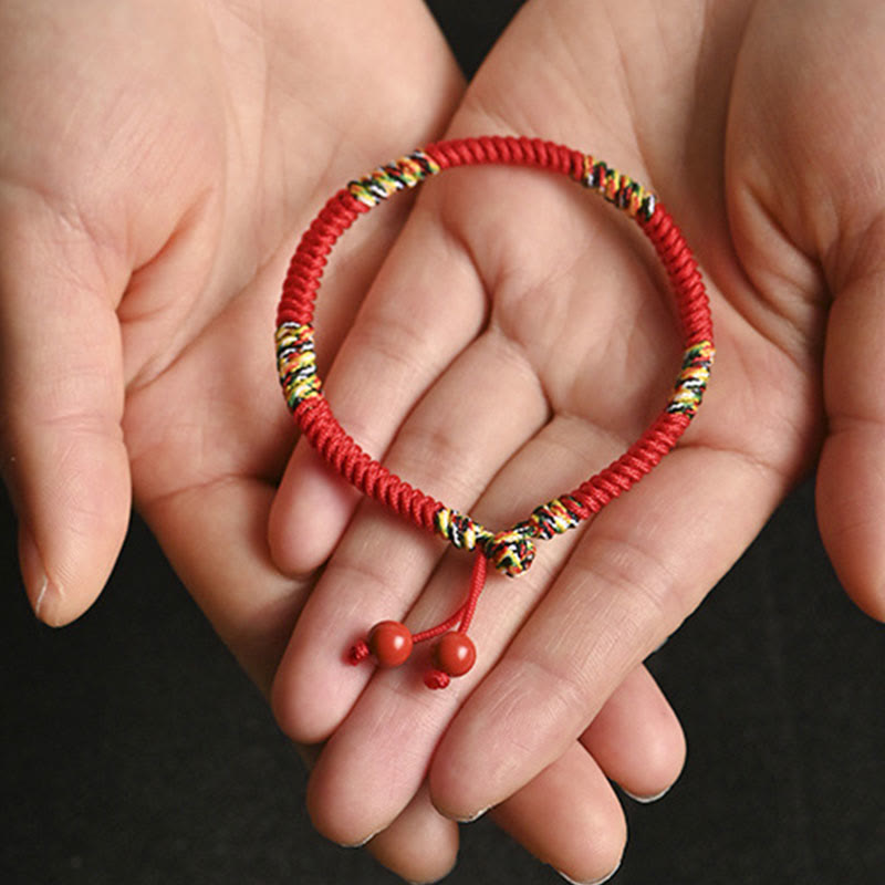 Rotes Armband Fünffarben – Schutz & Glück mit Perlen Handgelenk.