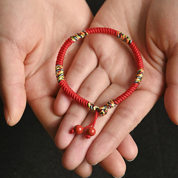Rotes Armband Fünffarben – Schutz & Glück mit Perlen Handgelenk.