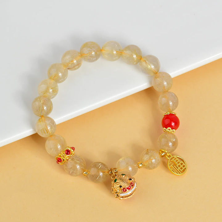 Armband Fu-Zeichen – Wohlstand mit goldenen Perlen und roten Akzenten elegant.