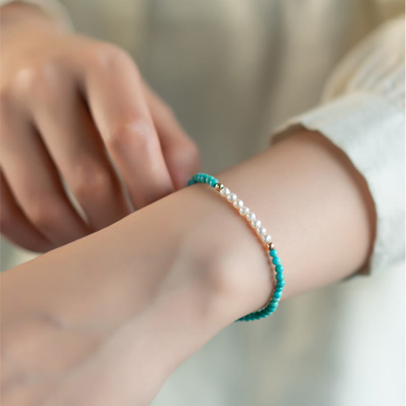 Türkis Armband 925 Silber Perlen Handgelenk elegantes Design getragen