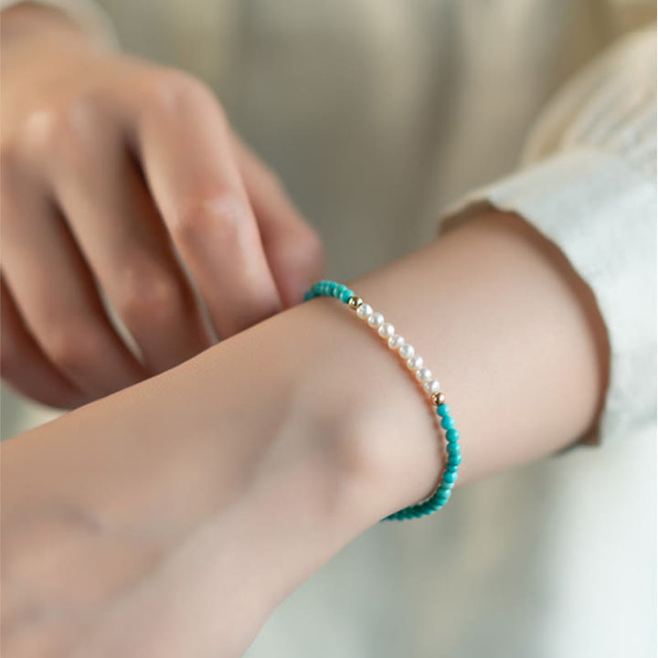 Türkis Armband 925 Silber Perlen Handgelenk elegantes Design getragen