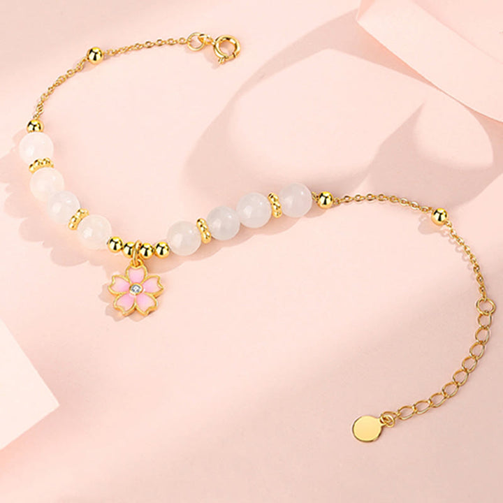 Armband 925 Silber weiße Jade Blütenanhänger elegant getragen