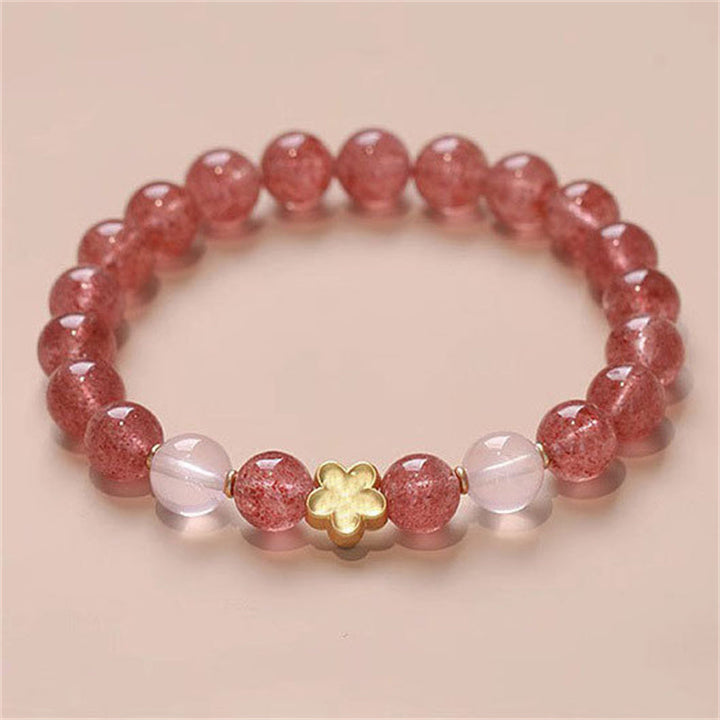 Armband Erdbeerquarz Pfirsichblüte elastisch Naturstein rosa transparent golden