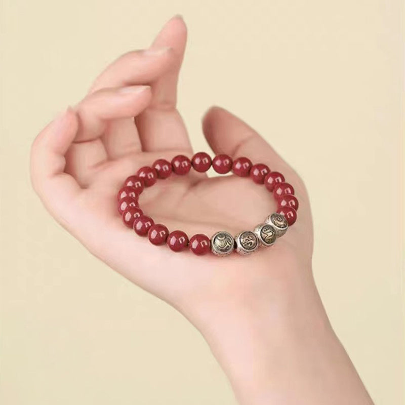 Rotes Zinnober Armband 925 Silber Perlen Handgelenk getragen elegant